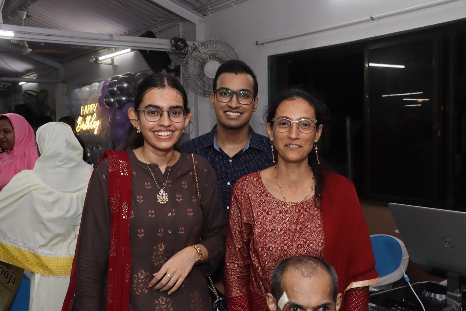 Smiling together at a birthday celebration
